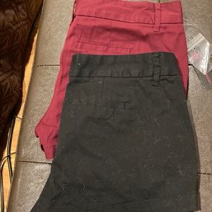Junior shorts - two pair (black gently worn and maroon are new with tags )